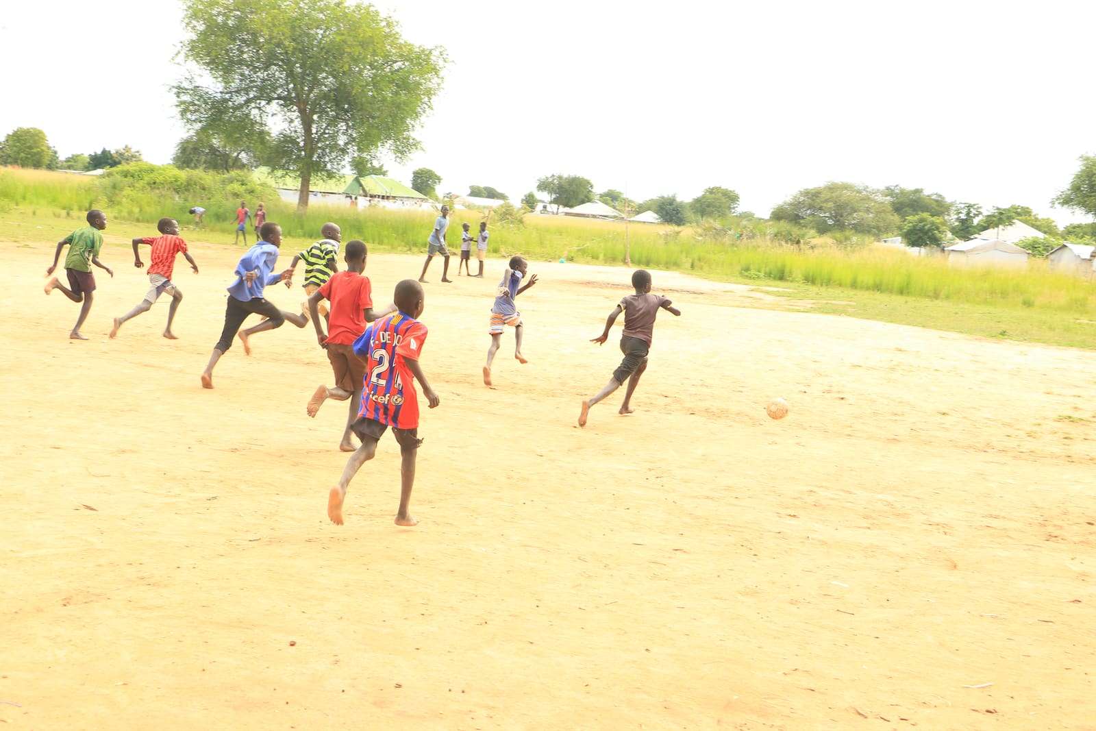 A football game on a wide open field