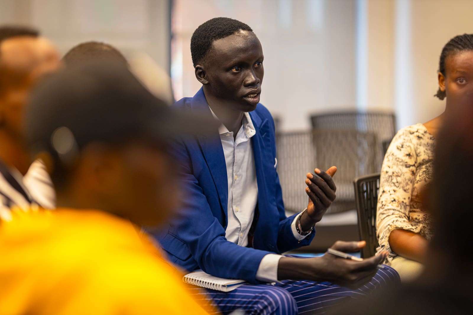 The founder listening closely during a discussion