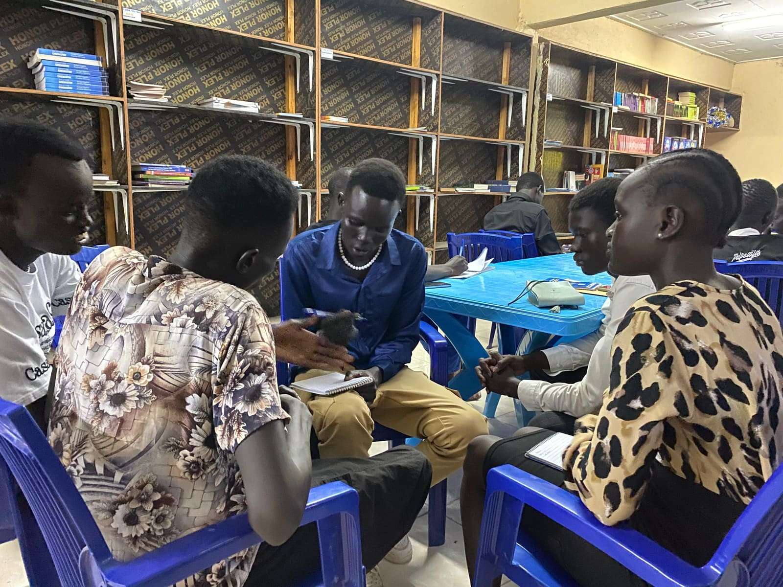Young participants in discussion at a workshop