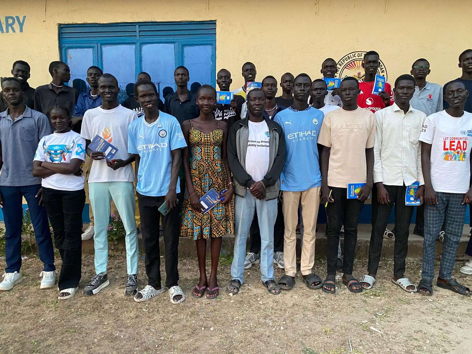 Workshop participants in a group photo outside